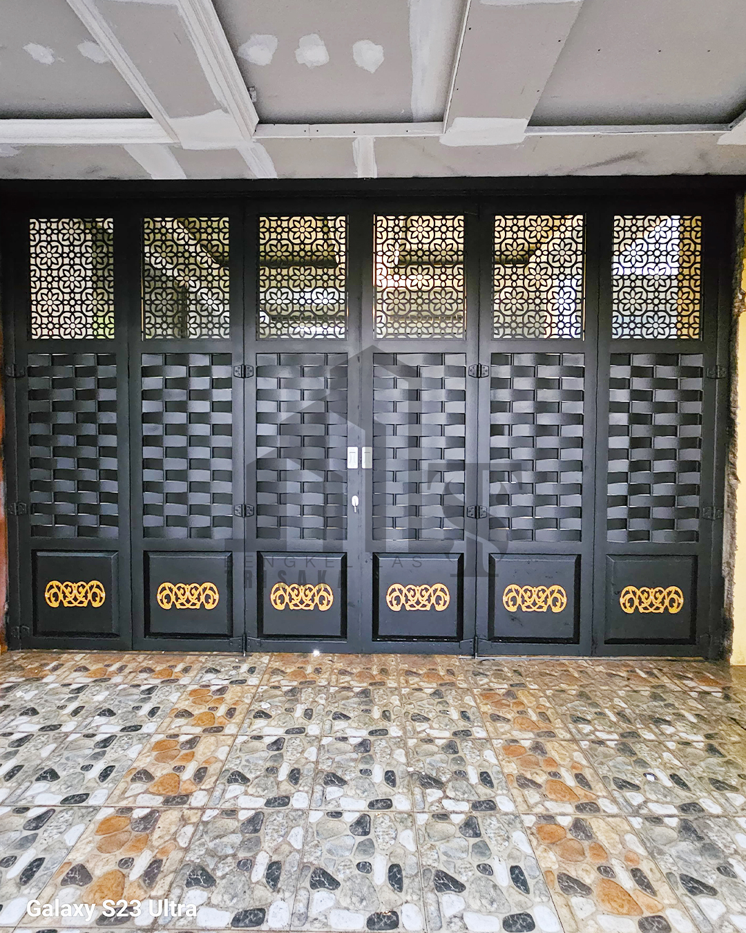 Pintu lipat laser cutting dan railing kaca bogor jawa barat